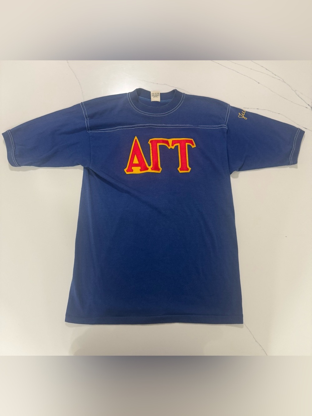 Vintage late 60s / early 70s Alpha Gamma Tau fraternity athletic tee.